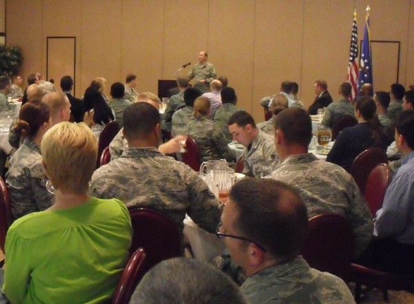 Col. Patrick Flood, USAF, the 548th Intelligence Surveillance and Reconnaissance Group commander, addresses a packed house at Beale Air Force Base during the chapter's April luncheon.